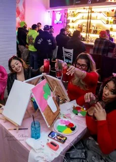 Friends painting together at a party