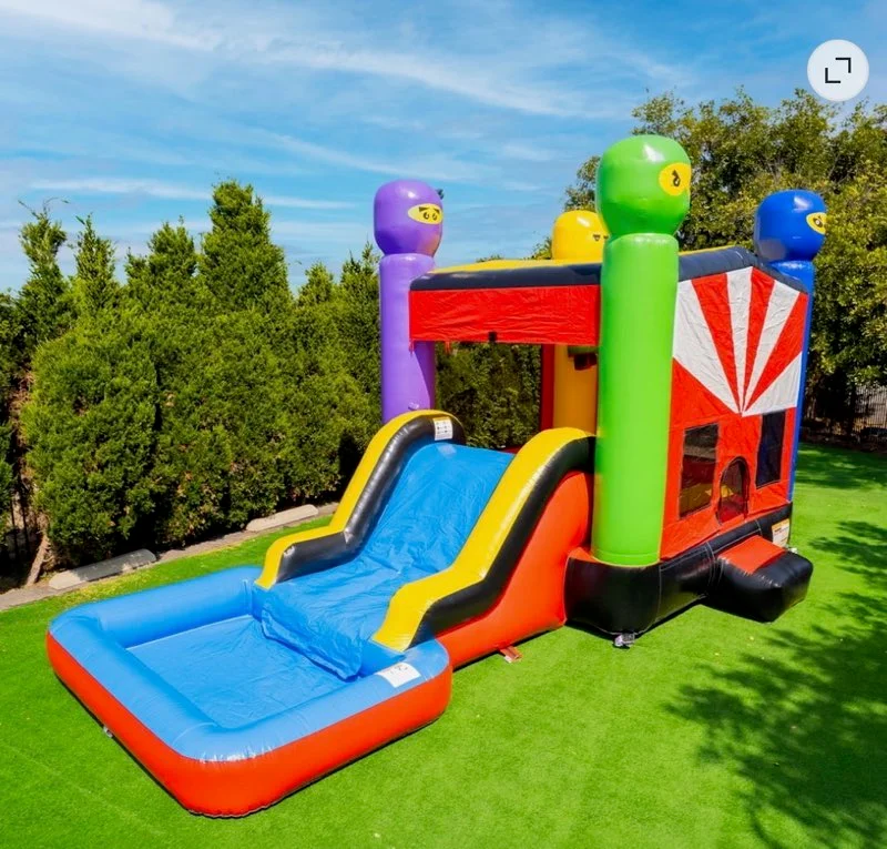 Outdoor bounce house and slide
