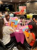 Guests enjoying a Sip & Paint gathering