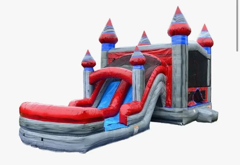 Red and gray castle bounce house with slides