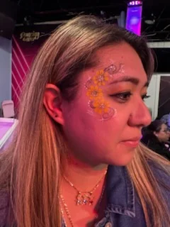 Guest with floral face paint
