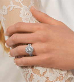 A woman wearing a platinum engagement ring