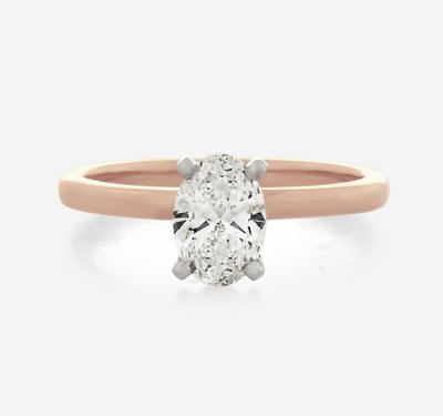 A solitaire rose gold engagement ring