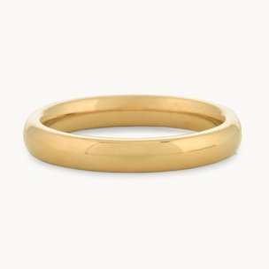 A yellow gold all metal women's band