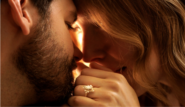 A woman wearing a diamond wedding ring set