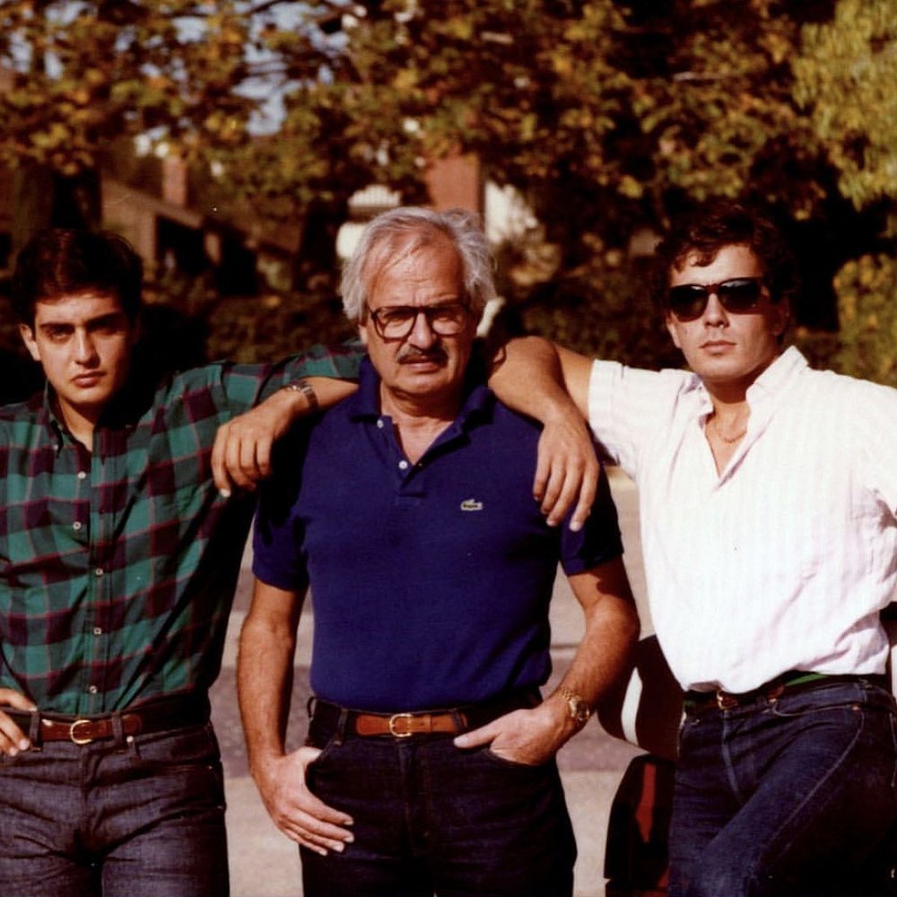 Georges and Daniel Daou pose with their father in the 1980s