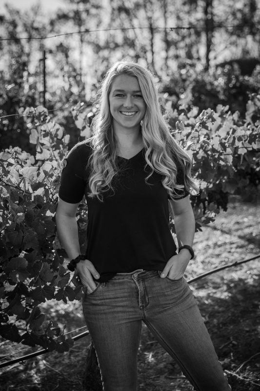 Madison Jackson in the vineyard