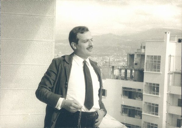 Joseph Daou standing on a balcony in Lebanon