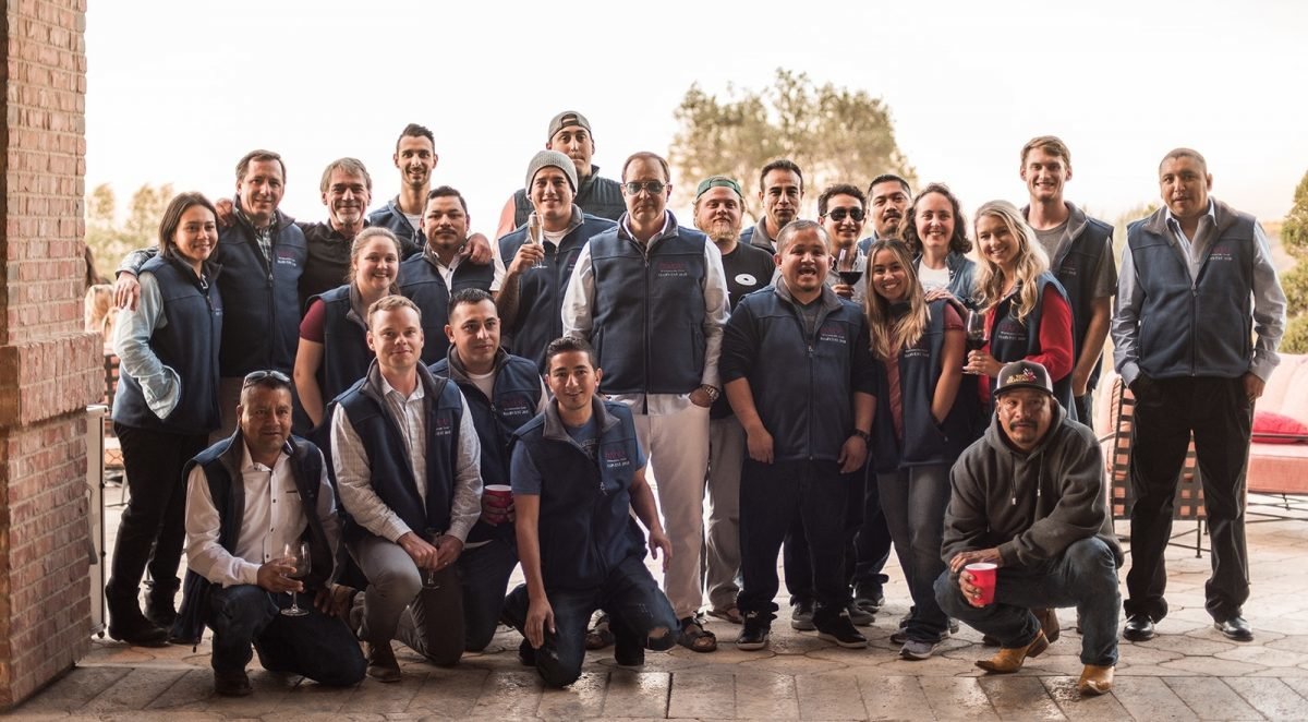 The DAOU team in  matching vests at the tasting room