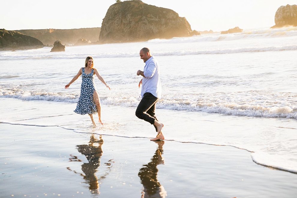 A couple standing at the beach