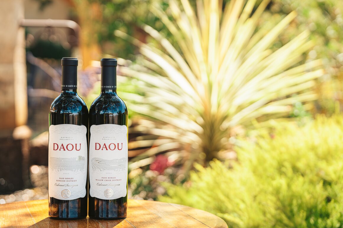 DAOU logo with Milwaukee Bucks logo over basketball arena