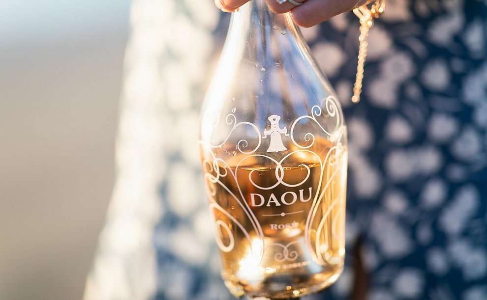 A half-empty of bottle of DAOU rosé