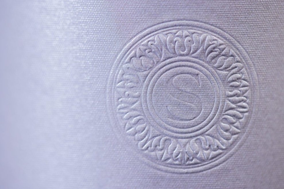 Closeup of Sequentis stamp on bottle