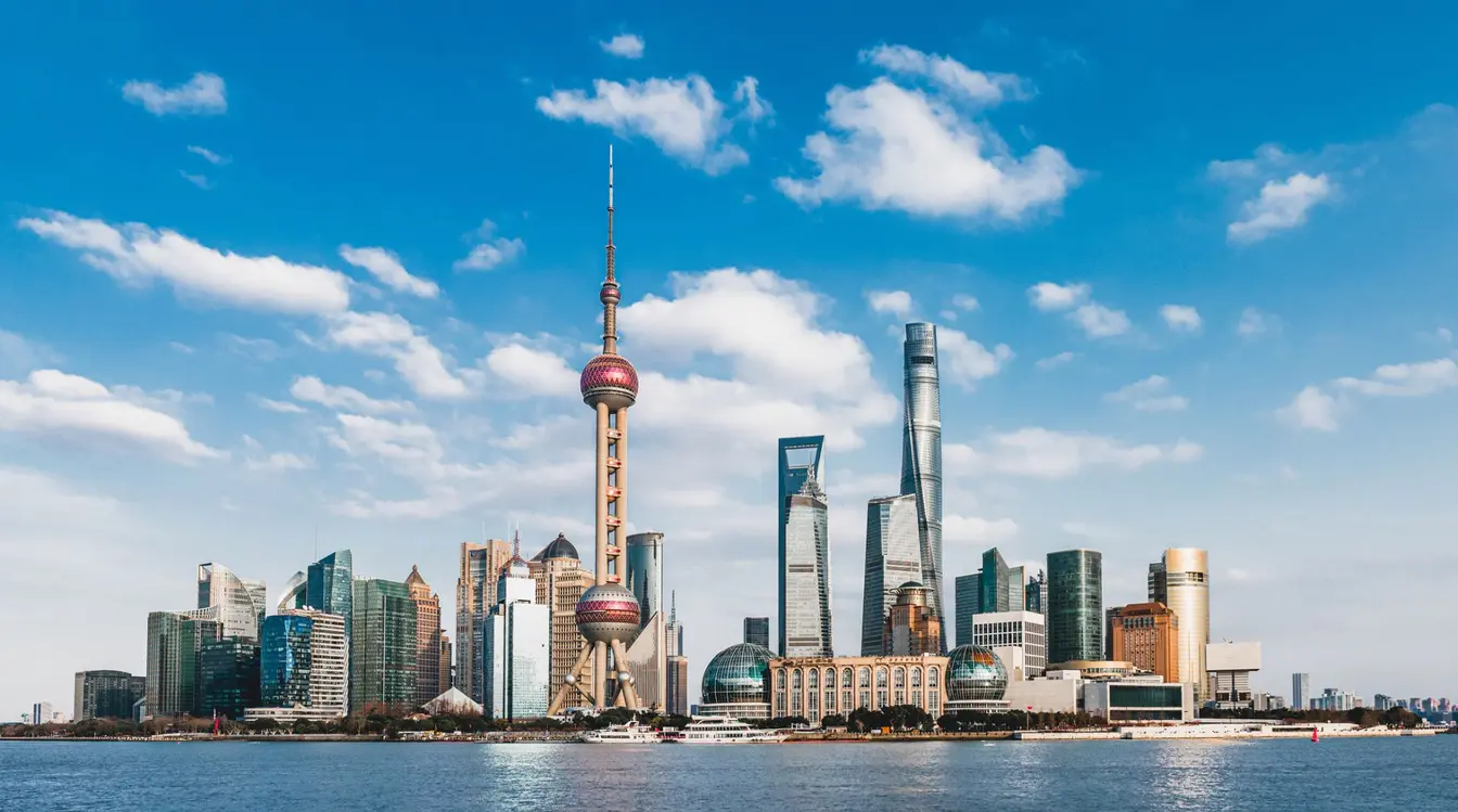 Panorama of the Shanghai Skyline and the Oriental Pearl Tower from across the Huangpu River.