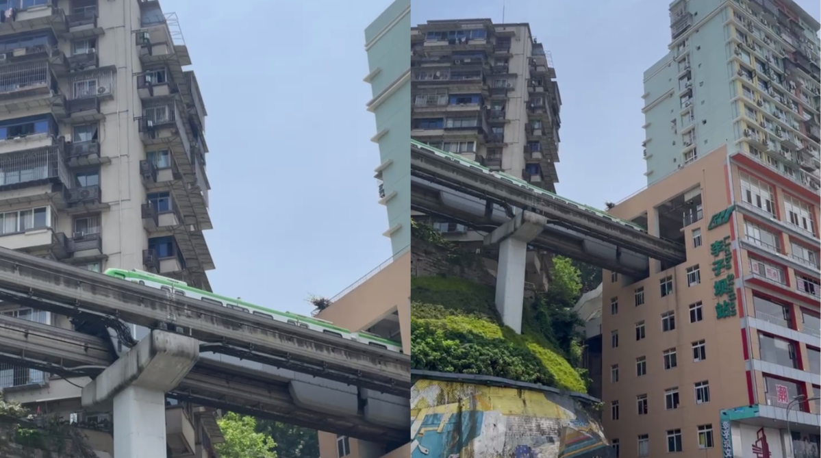 A train coming out of a residential building