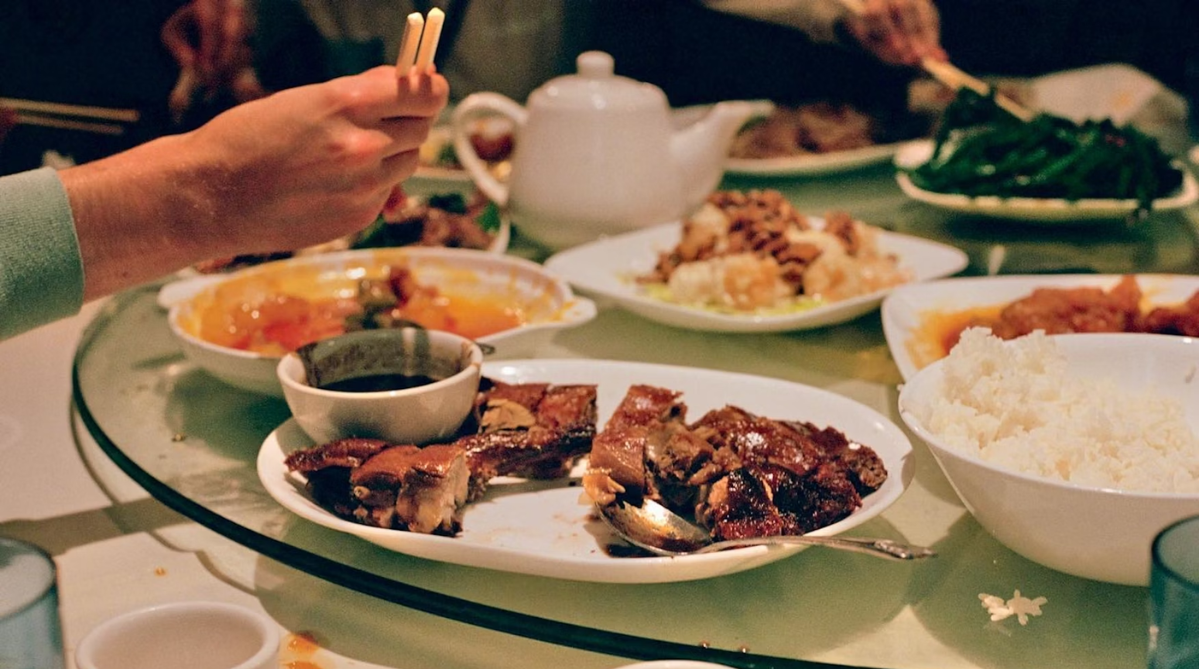 Chinese dishes atop a lazy Susan in a restaurant
