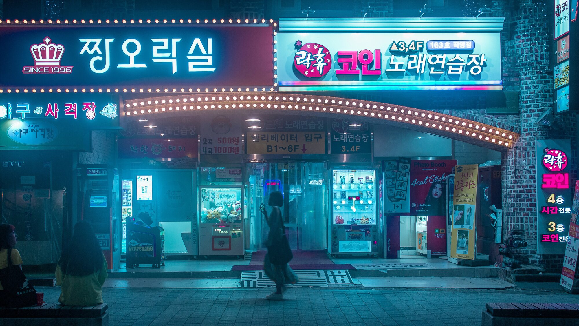 Neon lights along a city street in Seoul