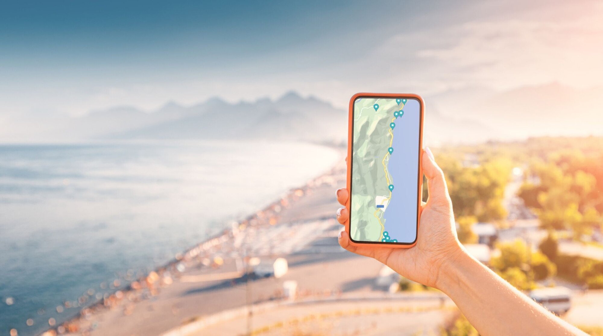 points marqué sur l'application google maps. Devant un paysage