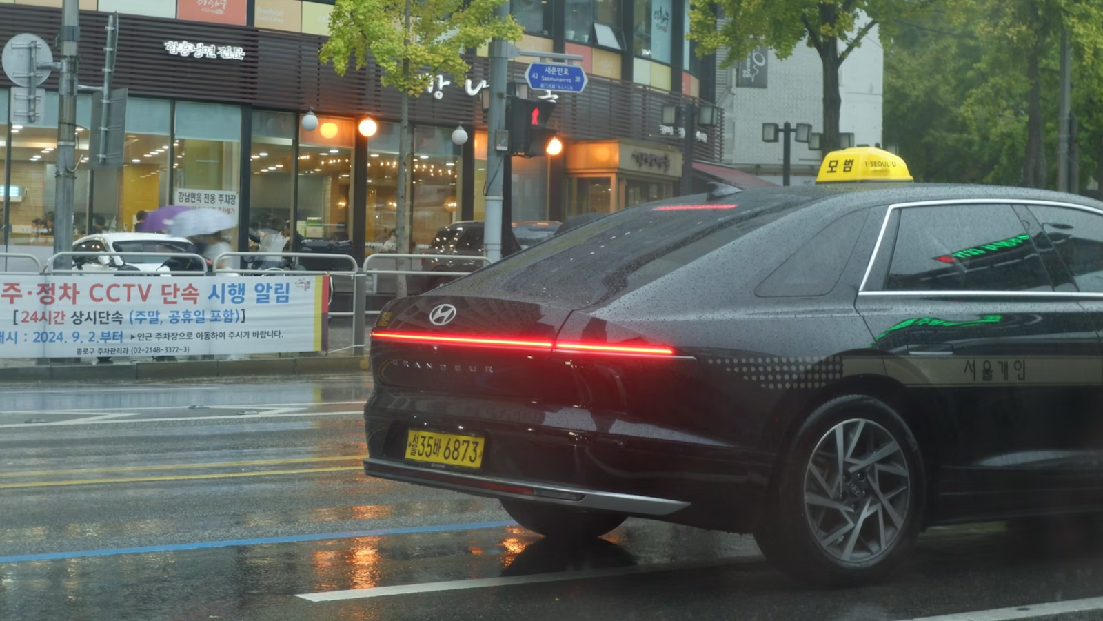 A black taxi on the road in South Korea