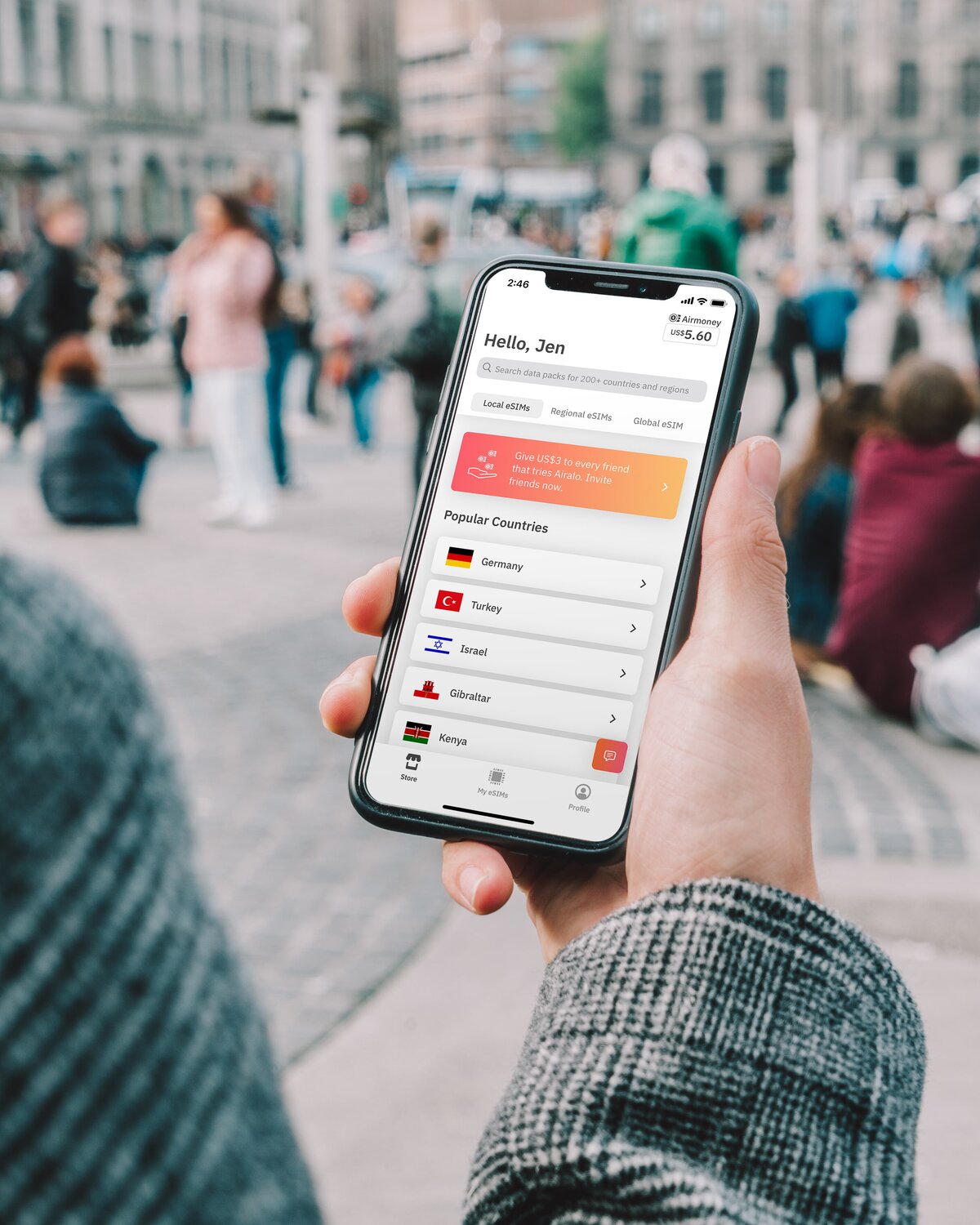 Person traveling and installing their Airalo eSIM
