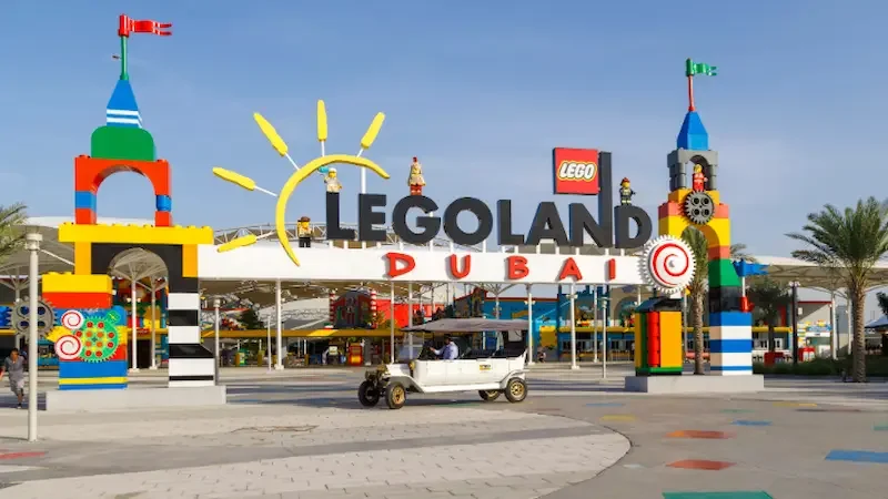 The LEGOLAND Dubai entrance, featuring colourful signage and the brand's famous red, white and yellow logo.