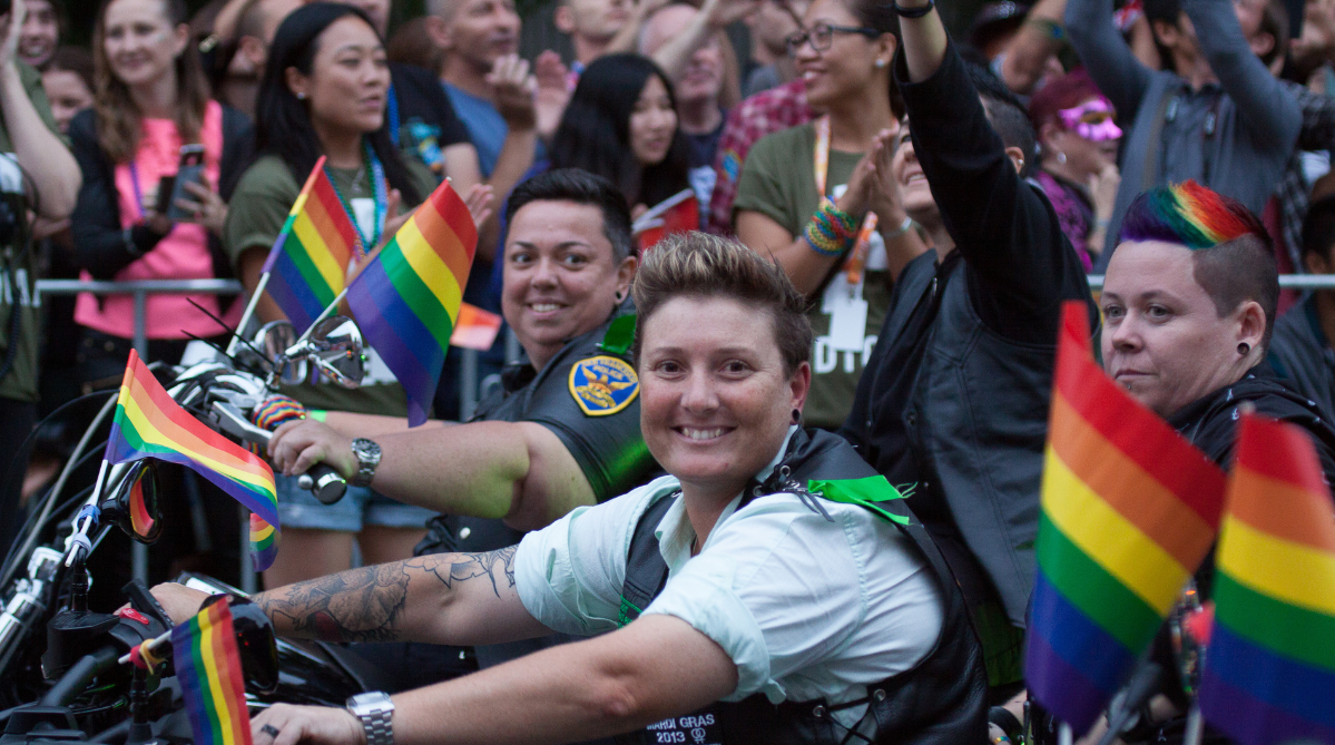 Police officers participating in a parade at the Sydney Gay and Lesbian Mardi Gras