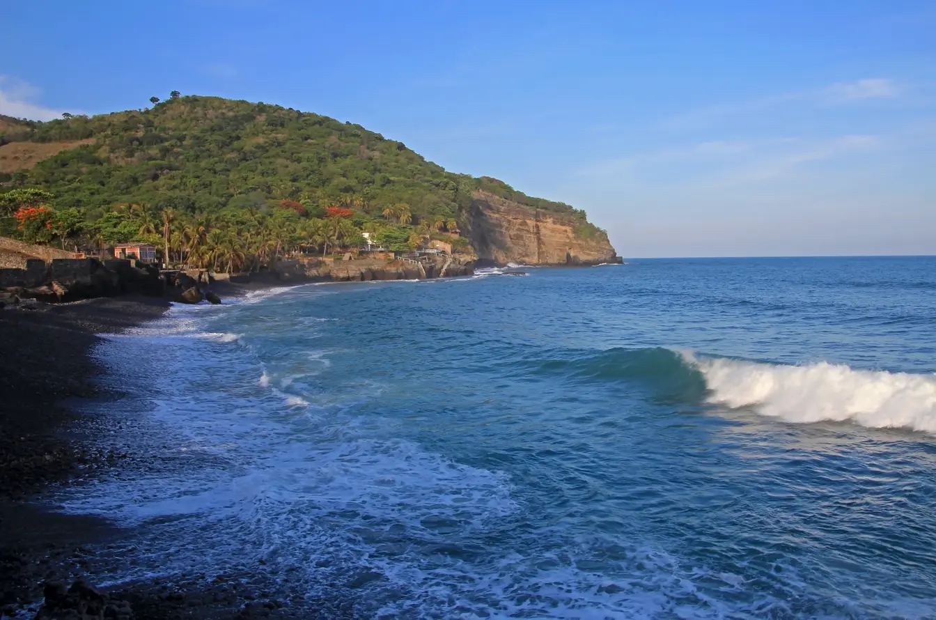 Blue waves and trees in El Zonte, El Salvador, Central America.