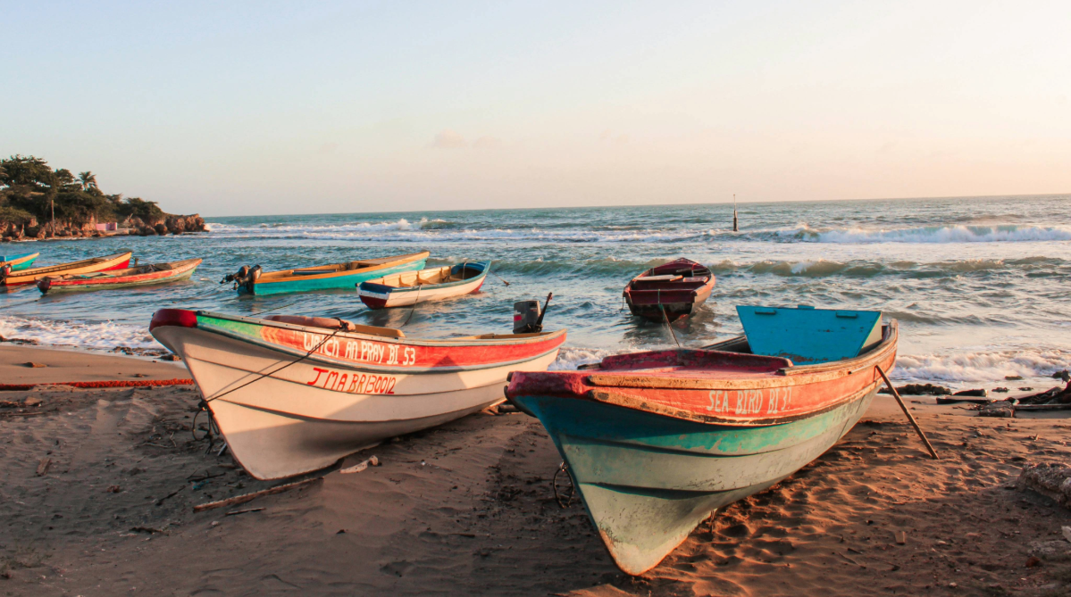 Boats on the shore in Treasure Beach, Jamaica