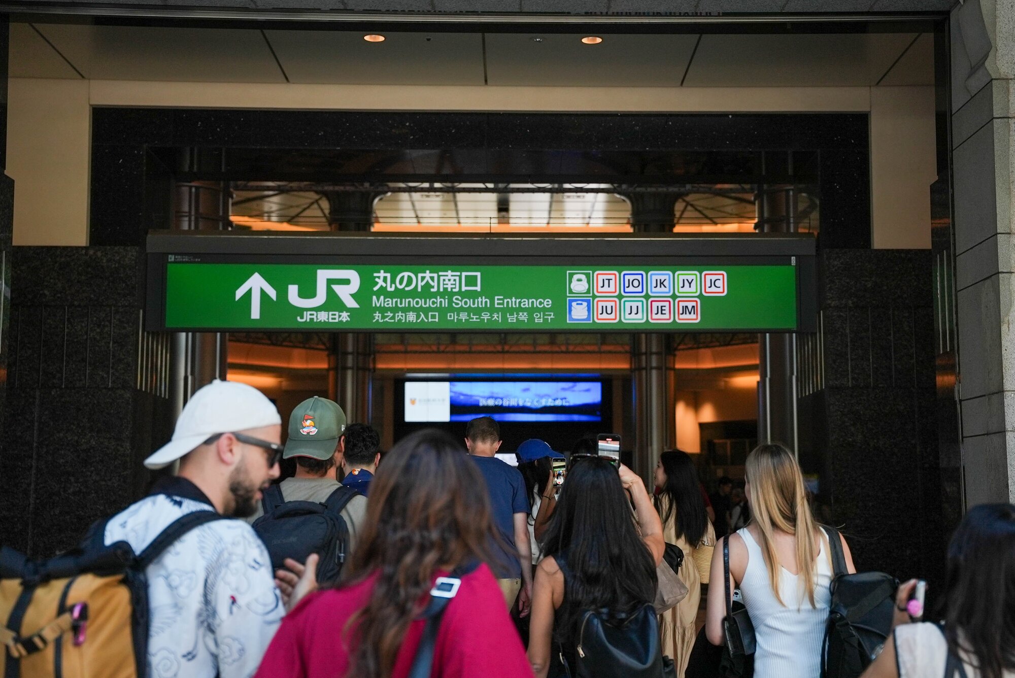 People heading to Shinkansen platforms