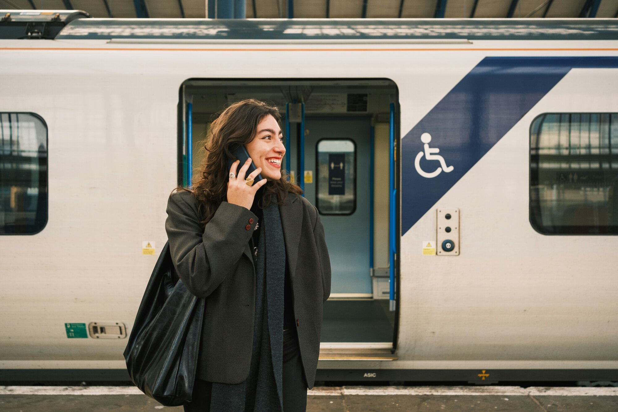 Woman on the phone, traveling