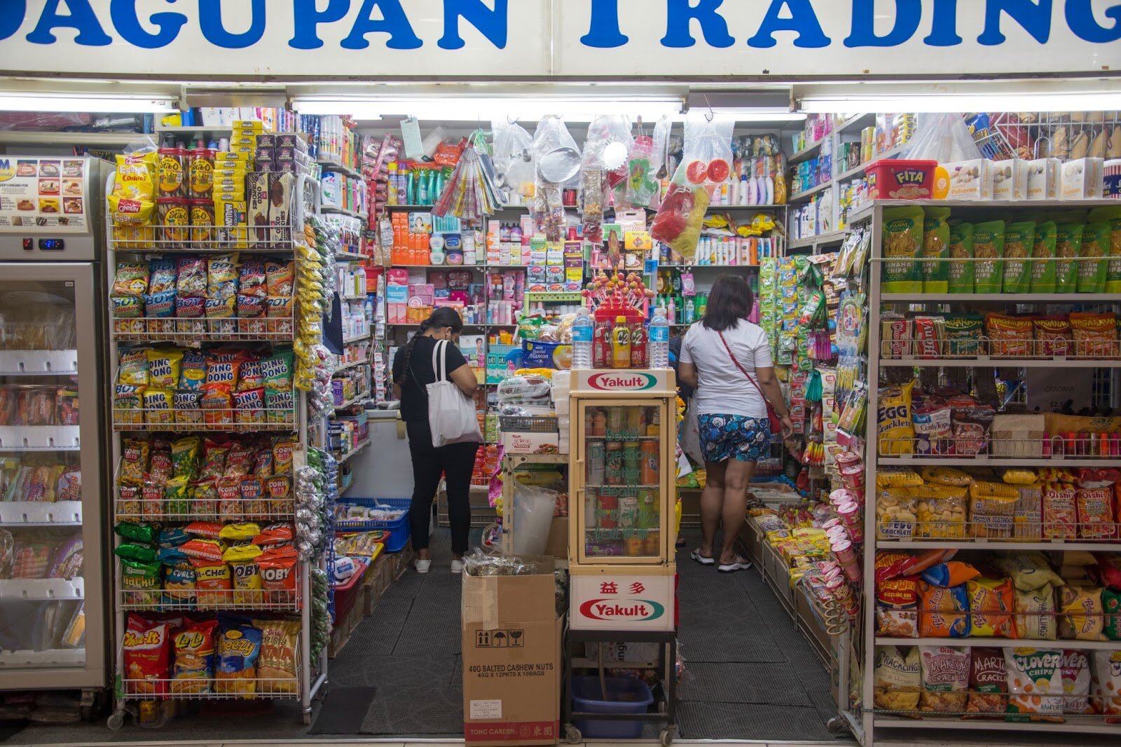 Philippines store with snacks displayed on the rack for sale at Lucky Plaza