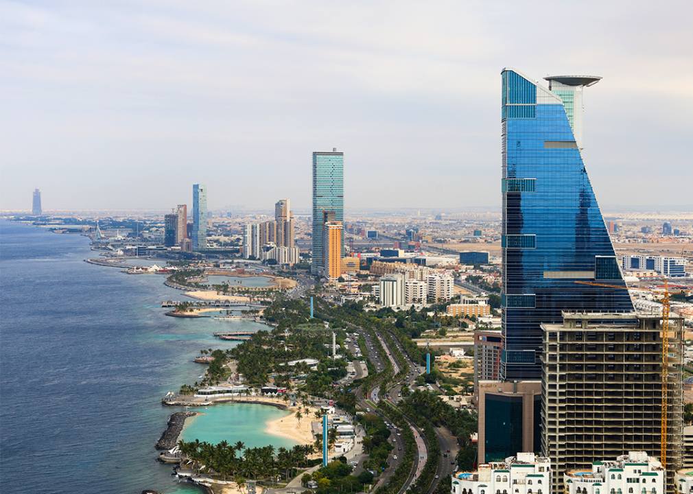 A high up view of the Red Sea next to a city. 