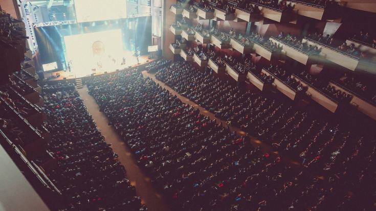 Packed audience at a PAX West event, showing what PAX is all about — live panels, entertainment, and gaming culture in Seattle, easily shared online with a USA eSIM.