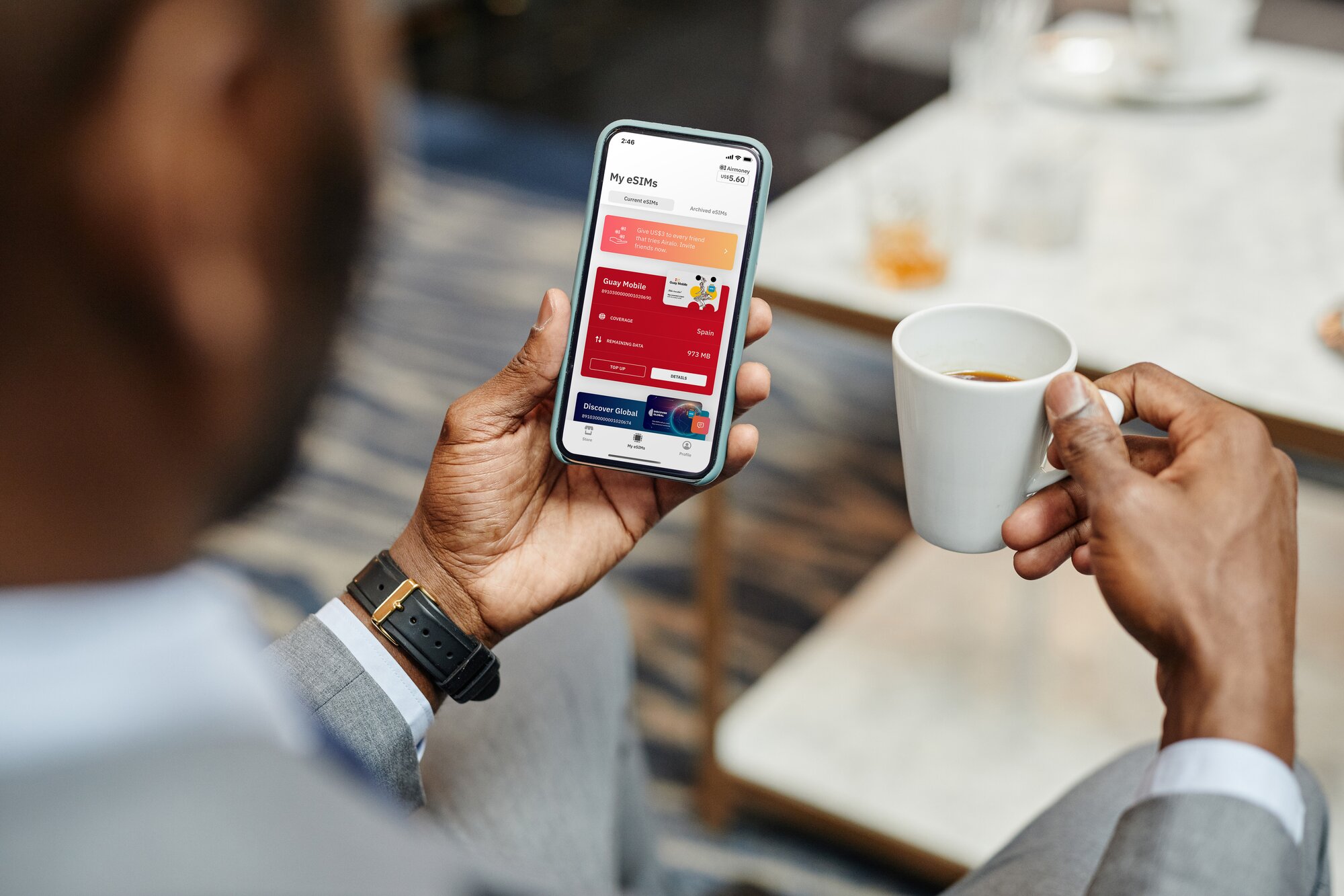 Man downloading eSIM on his phone