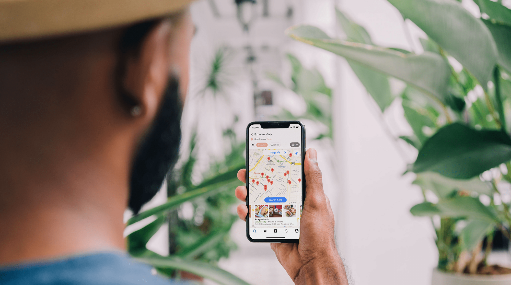 man looking at a map on his smartphone