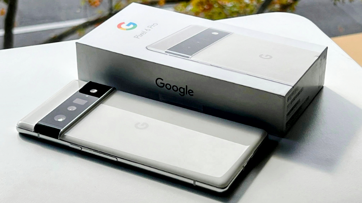 White Google Pixel 3a resting on its box on a desk, highlighting that eSIM support varies by Pixel model and should be checked before travel eSIM use, to illustrate a blog post entitled 'Are Google Pixel Phones eSIM Compatible?'