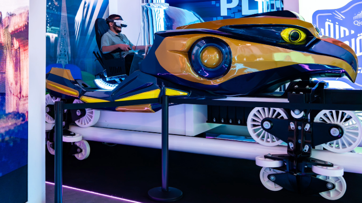 Fans enjoying immersive activities at Esports World Cup festival area.