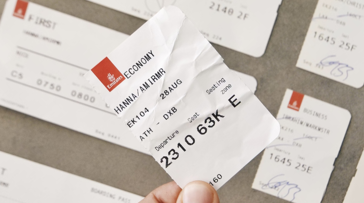 A torn boarding pass from Emirates Airlines