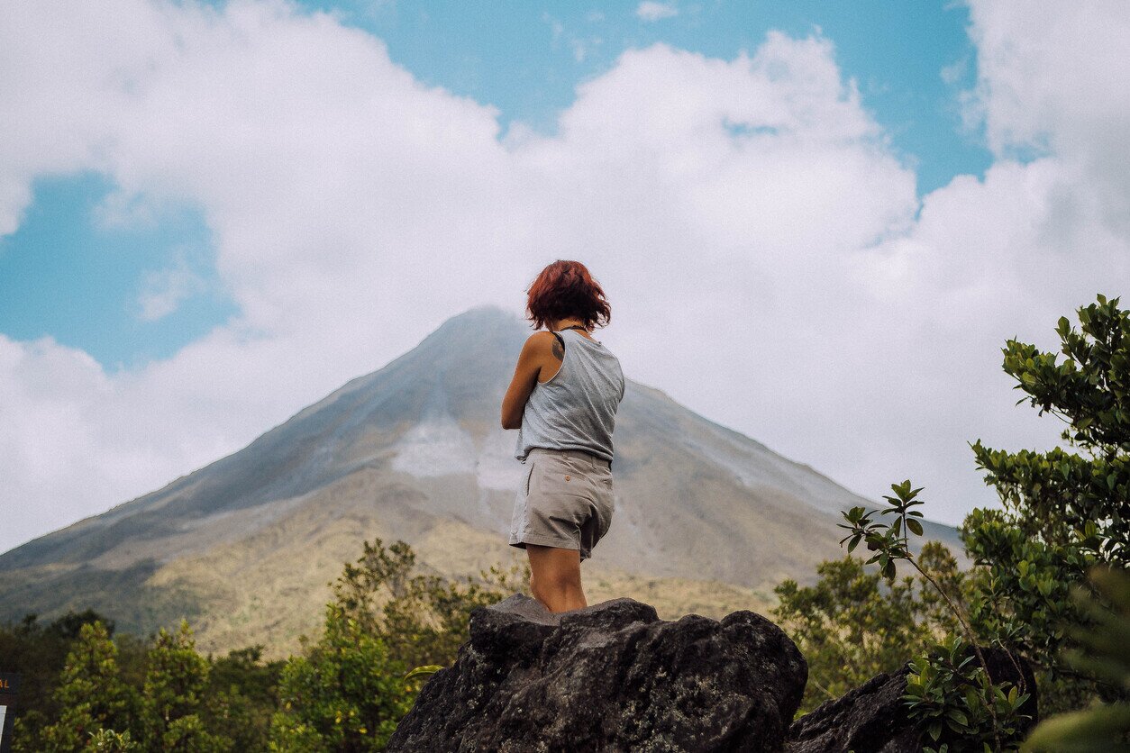 Woman looking at a mountain in Costa Rica