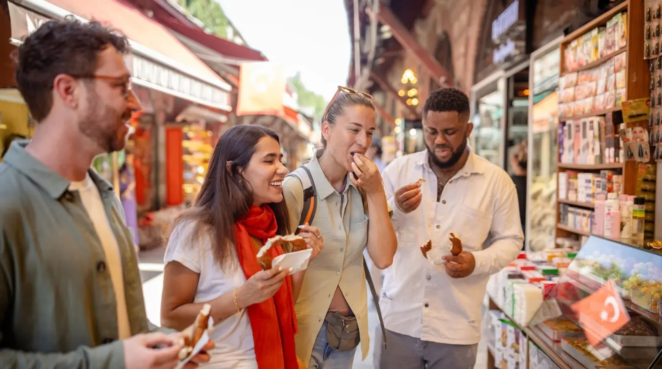 A group of friends eating snacks at a market stall in Serbia.
