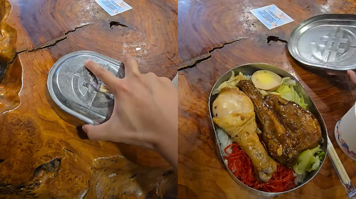 Man opening the Fenqihu bento box