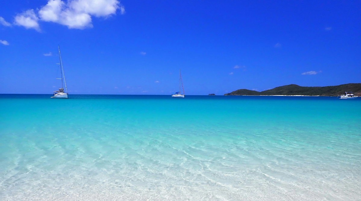 Whitehaven Beach with sailboats in the distance