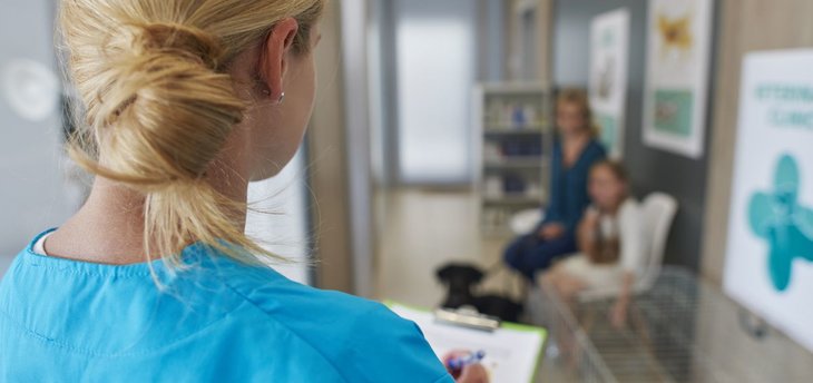 vet tech calls family in waiting room