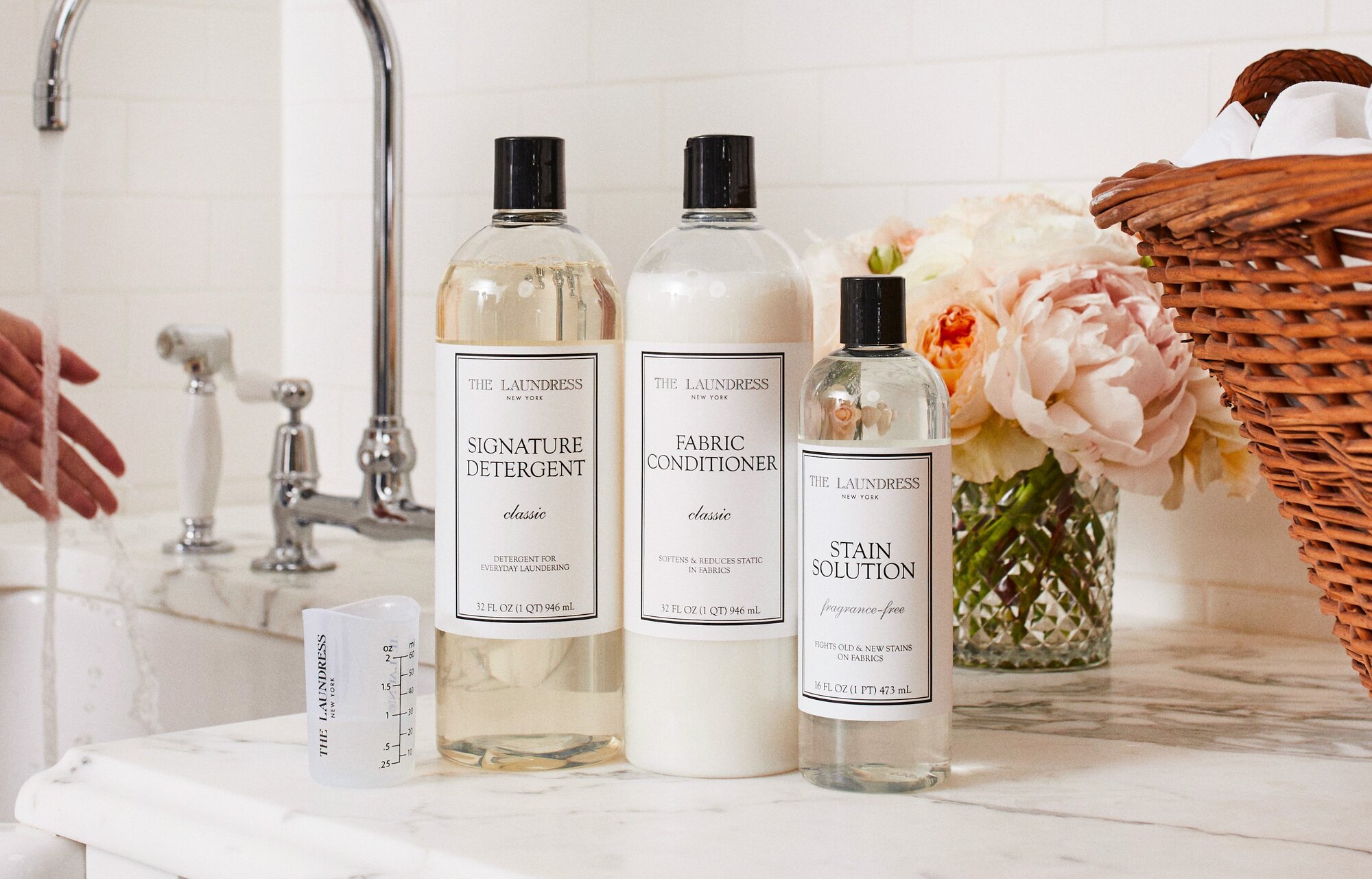 the laundress signature detergent, fabric conditioner, and stain solution wash routine for fabrics