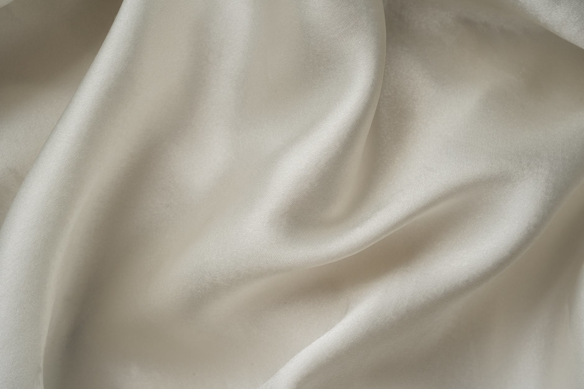 Cream colored viscose material.