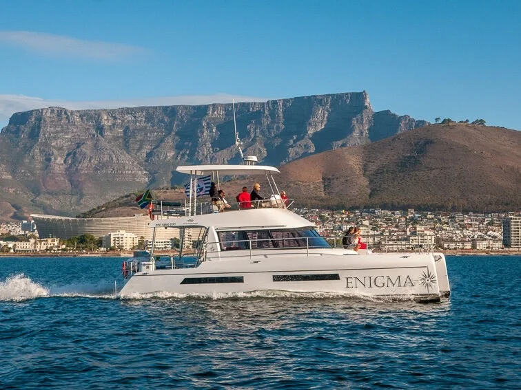 Luxury catamaran cruise with Table Mountain backdrop
