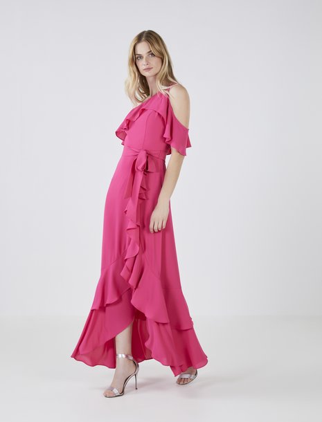 Picture of a woman in a hot pink ruffle evening dress