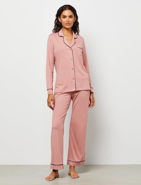 Picture of a woman wearing a pink pajama set