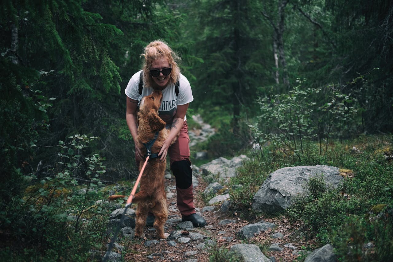 Woman on hike with dog