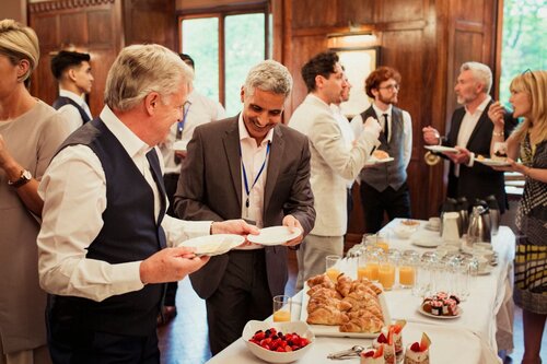 People chatting at a private breakfast networking event